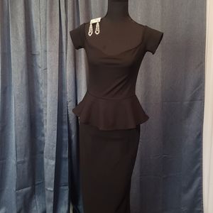 Black falbala pencil dress with cocktail earrings